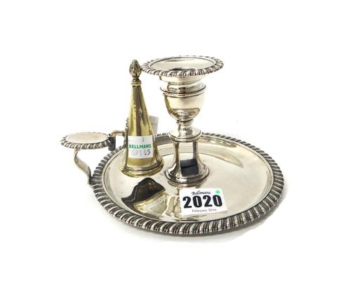 A George IV silver chamber candlestick, of circular form, decorated with gadrooned rims, with a detachable sconce by Robert Eames and Edward Barnard,