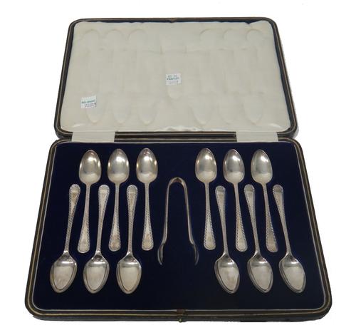 A set of twelve silver coffee spoons and a matching pair of sugar tongs, Sheffield 1921, cased, a set of six silver teaspoons, Sheffield   1977, cased