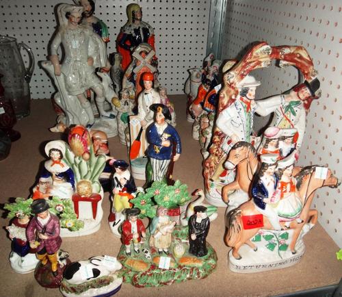 A quantity of assorted 19th century and later Staffordshire ceramic figures.