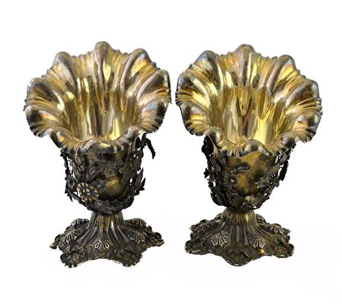 A pair of Ottoman parcel gilt silver cups, Turkey, with mark (Tughra) of Sultan Abd Al-Hamid, each of flared form, having floral and foliate mounts to