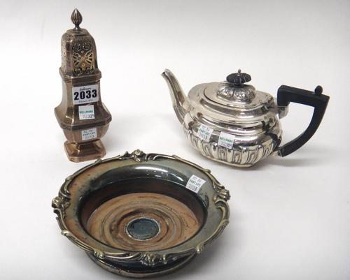 A silver teapot, of squat oval form, with partly fluted decoration, Birmingham 1903 and a silver sugar caster, of baluster square section form, in the