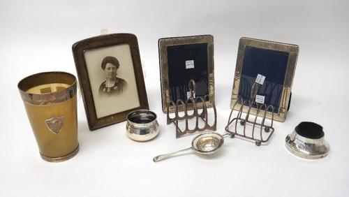 Silver and silver mounted wares, comprising; a Victorian horn beaker, London 1878, a circular pen wiper, a tea strainer, a small bowl, having a pierce