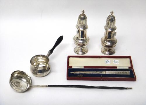 A group of silver and silver mounted wares, to include; a near pair of sugar casters of baluster form, Birmingham 1960, a brandy warming pan, Sheffiel