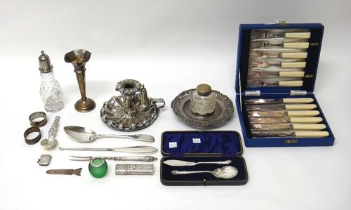 Silver and silver mounted wares, comprising; a faceted glass sugar caster, Sheffield probably 1830, a green glass match striker, Birmingham 1901, a re