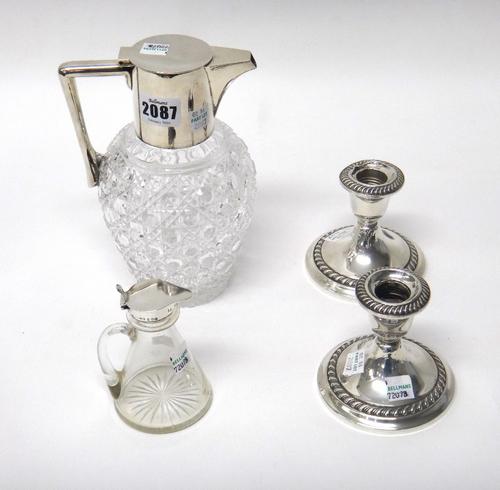 A silver plated metal mounted hobnail cut glass hinge lidded claret jug, a silver mounted glass whisky noggin, with a handle, Birmingham 1934 and a pa