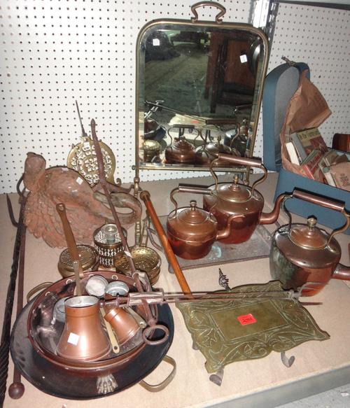 A quantity of 19th century and later metalware collectables, mainly fireside items, including trivets, a fireguard, a toasting fork, kettles and sundr