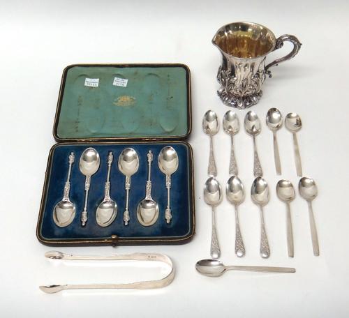 Silver, comprising; a set of six teaspoons, having spiral stems and with figure terminals to the handles, London 1903, cased, a christening cup, with