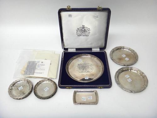 A silver circular dish, commemorating The Royal Wedding 1947-1972, engraved with a coat of arms to the centre and having a beaded border, diameter 20c