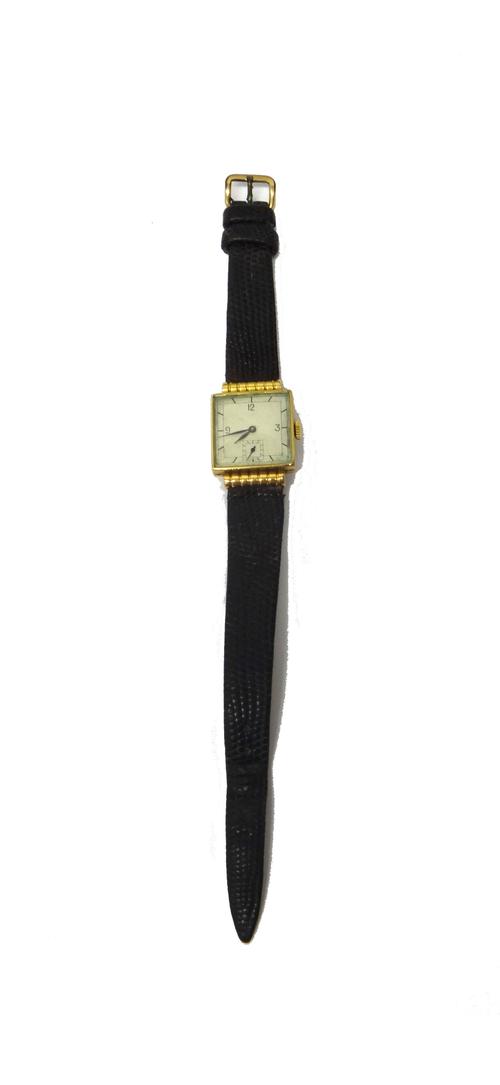 A lady's 18ct gold square cased International Watch Co wristwatch, with a signed circular jewelled movement, the square silvered dial with black Arabi