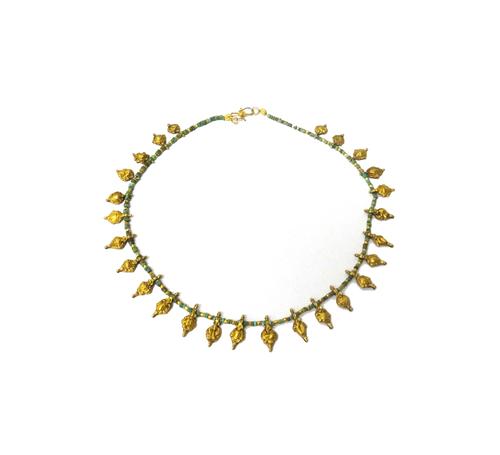 A gold and turquoise coloured bead necklace, the front with a row of gold drops, in a variety of designs and on an 'S' shaped clasp, possibly Indian.