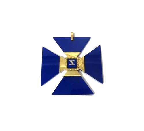 A gold mounted blue glass pendant, in a Maltese Cross shaped design, the front mounted with a diamond set 'X' shaped motif, the back glazed with a squ