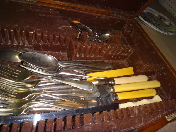 An oak cased canteen of plated flatware.