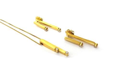 A Garrard 18ct yellow gold and diamond set pendant necklace, in a stepped twin section rectangular design, collet set with two circular cut diamonds,