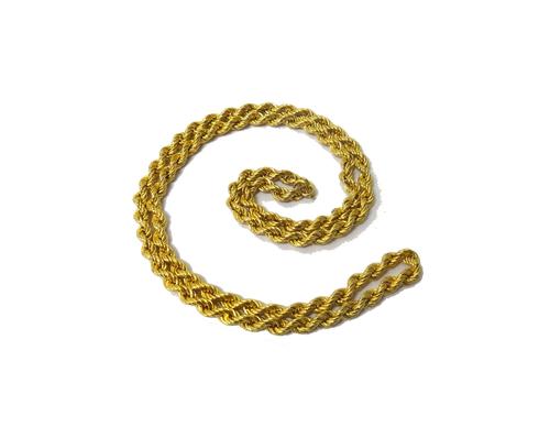 A gold ropetwist link neckchain, detailed Italy 18 K, on a boltring clasp, weight 18.5 gms.