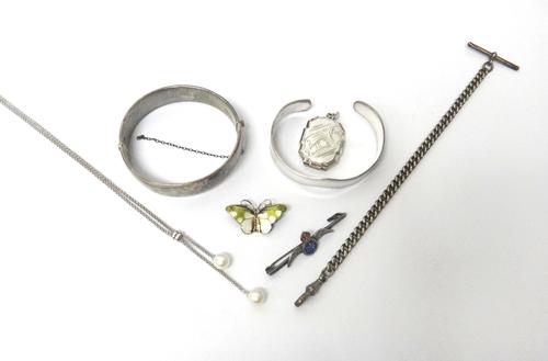 A 9ct gold pendant, mounted with a circular cut diamond, a gold and lime coloured green paste set pendant, a pendant mounted with a cultured pearl, th