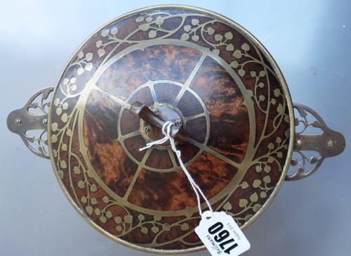 An 18ct gold, ruby and diamond set five stone ring, mounted with three cushion shaped rubies, alternating with two smaller cushion shaped diamonds, Bi