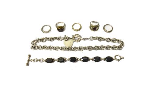 A Tiffany & Co silver neckchain, of circular link form, with a T bar and circular clasp, detailed Tiffany & Co and with a Tiffany & Co heart shaped pe