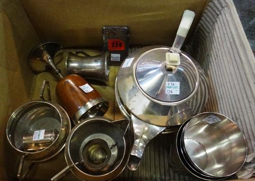 A group of silver and plated wares to include; a planished card case, a christening mug, a pepper pot, a plated three piece tea set, three beakers and