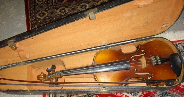 A 19th century cased violin and bow.