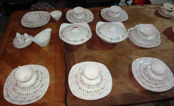 A Midwinter dinner and tea service by Jessie Tait, decorated in the "Cherokee pastel" pattern for approximately six place settings (one breakfast bowl