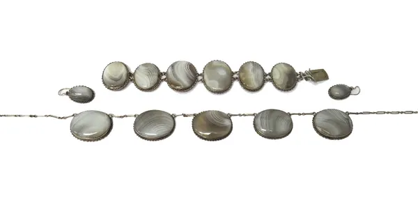 A banded grey agate suite of jewellery, comprising; a five stone necklace, a five stone bracelet and a pair of single stone earrings, the tops having