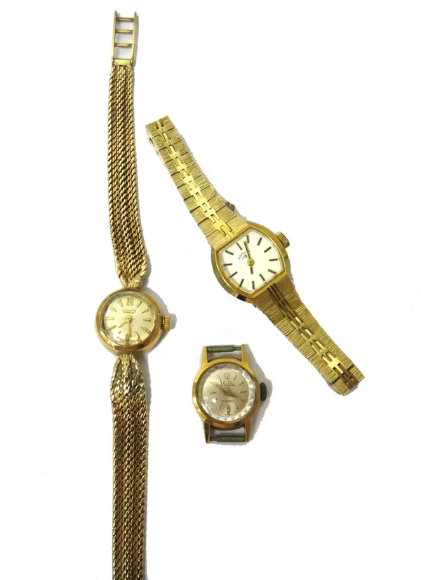 A lady's 9ct gold Tissot bracelet wristwatch, the signed circular dial with gilt arrow shaped and Arabic numerals, on a tapering woven mesh link brace