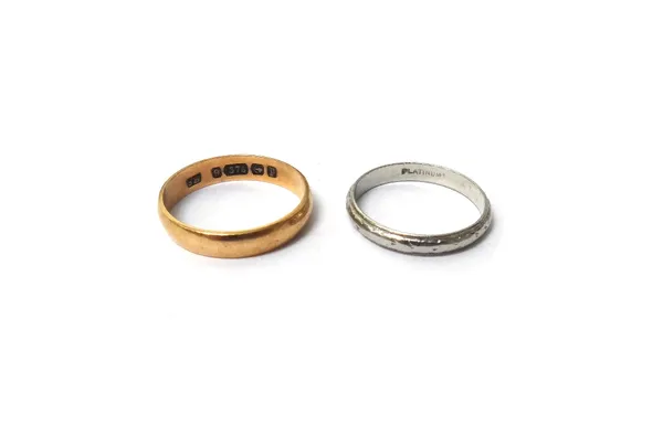 A platinum wedding ring, ring size M, weight 2.5 gms and a 9ct gold plain wedding ring, ring size N, weight 1.7 gms.