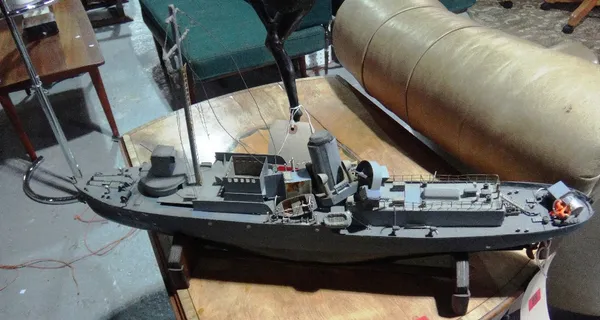 A 20th century scratch built model of a boat.