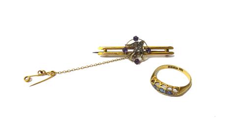 An 18ct gold, sapphire and rose diamond set ring, in a boat shaped setting, ring size N and a half and a gold, amethyst and colourless paste set bar b