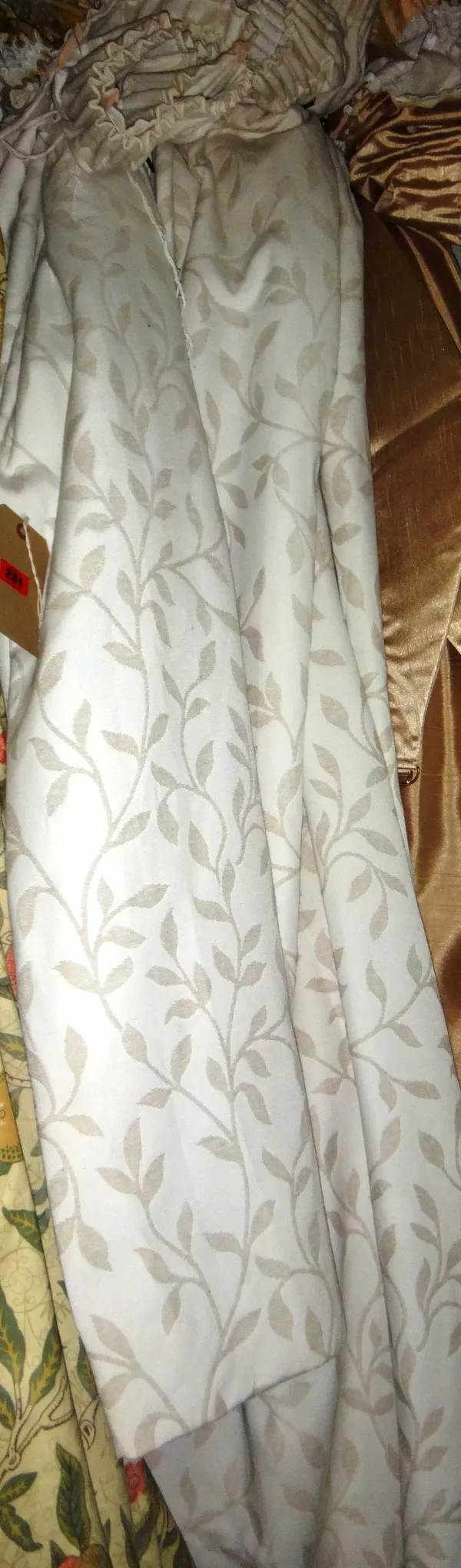 A pair of John Lewis cream floral curtains, each curtain 140cm wide x 210cm long, together with another pair, each curtain 90cm wide x 130cm long. (4)