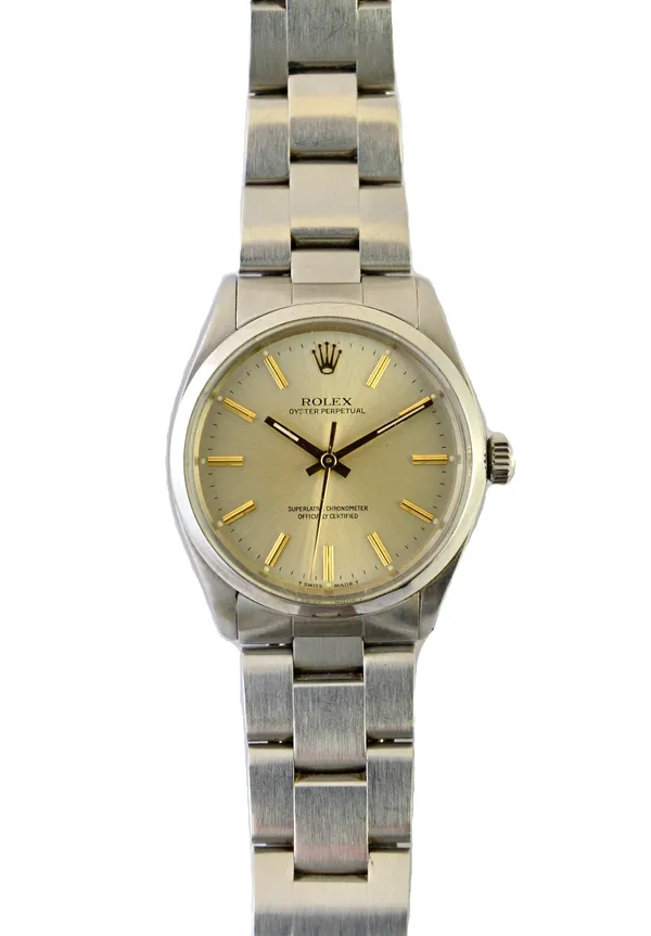 A gentleman's steel Rolex Oyster Perpetual bracelet wristwatch, the signed circular silvered dial, with gilt baton shaped numerals, gilt hands and wit