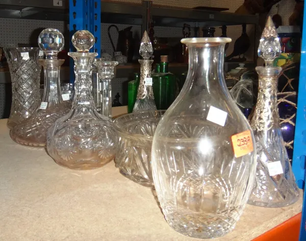 A quantity of cut glass, including decanters, bowls, candlesticks, vases and sundry.