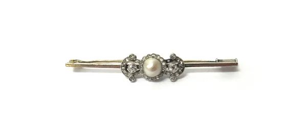 A diamond and cultured pearl set bar brooch, mounted with the single cultured pearl at the centre, in a surround of rose cut diamonds, between diamond