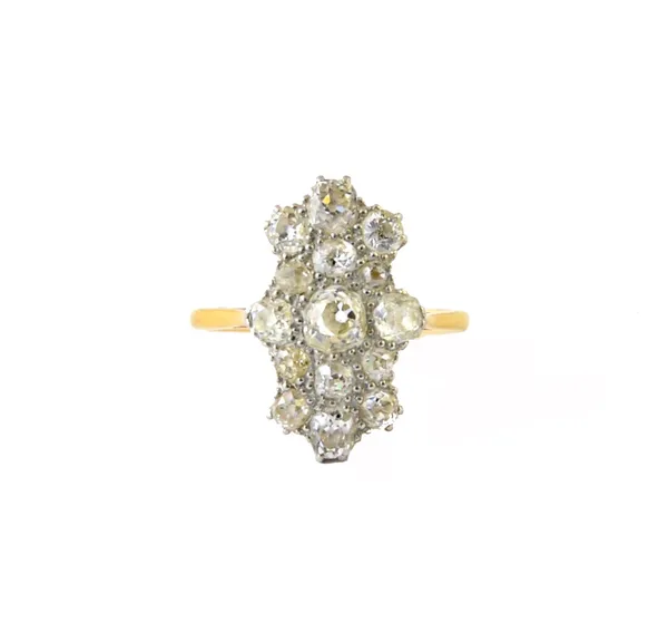 A gold and platinum, diamond set panel shaped cluster ring, mounted with cushion shaped diamonds, detailed 18 CT PT, ring size O.  Illustrated