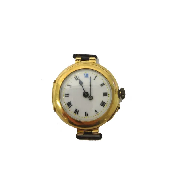 A lady's 15ct gold circular cased wristwatch, with a jewelled Swiss lever movement, the enamelled dial with Roman numerals, import mark London 1912.