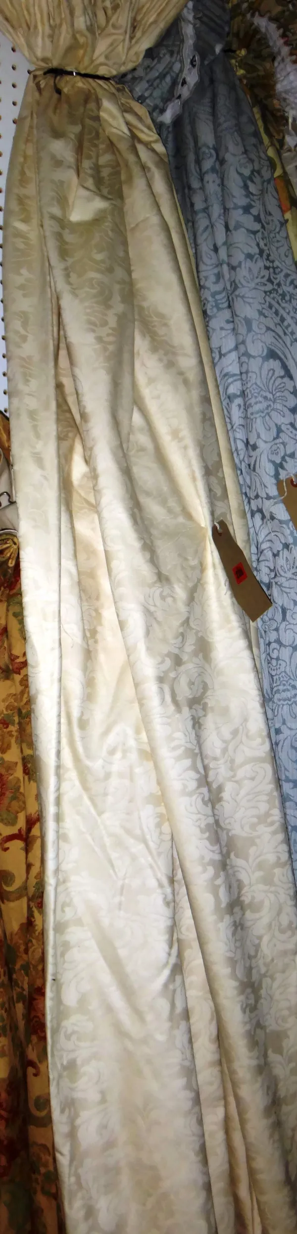 Two pairs of cream silk curtains, each curtain 70cm wide x 180cm long. (4)