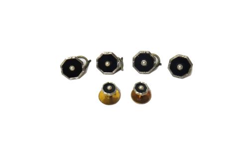 A gold and platinum mounted black onyx and half pearl set part dress set, comprising; four dress buttons, each detailed 18 CT & PT and two dress studs