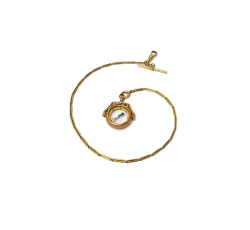 A 9ct gold mounted compass pendant fob and a gold twin bar link dress Albert chain, fitted with a gold T bar, a swivel and a boltring, detailed 18 C,