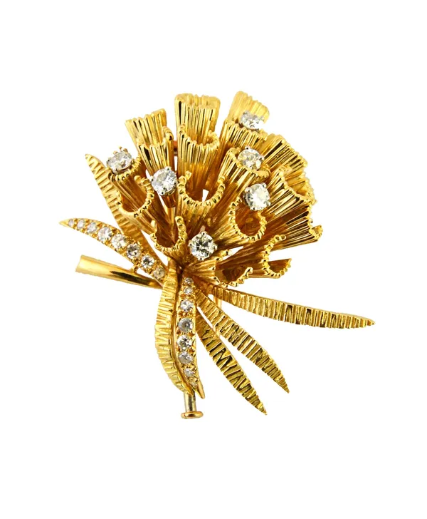 A gold and diamond set brooch, designed as a floral spray, having a textured finish, mounted with circular cut diamonds, circa 1950, gross weight 22 g