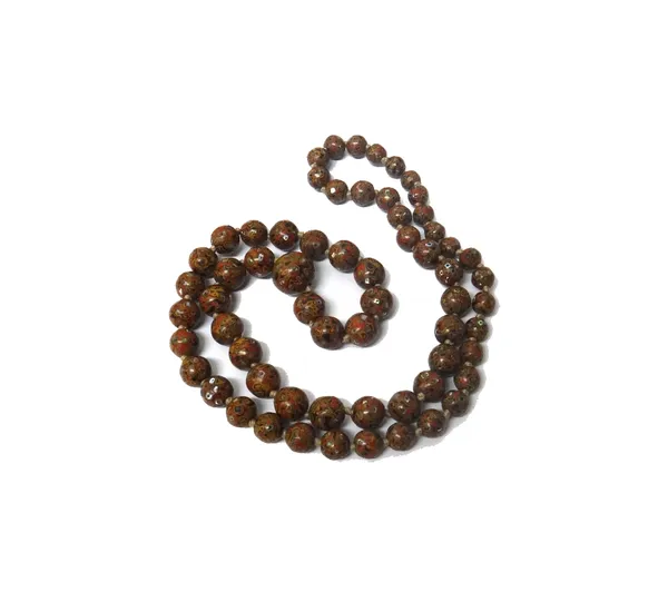 A single row necklace of mother of pearl inlaid Japanese lacquered spherical beads, graduating in size to the front and a jade bi circular disc, pierc