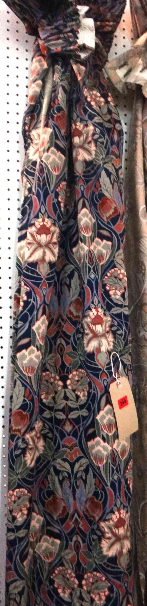 A pair of William Morris style blue floral curtains and tie backs, each curtain 120cm wide x 210cm long.