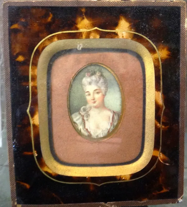 An oval portrait miniature of a lady, in 18th century dress, displayed in a glazed imitation tortoiseshell rectangular frame, detailed to the back Pri