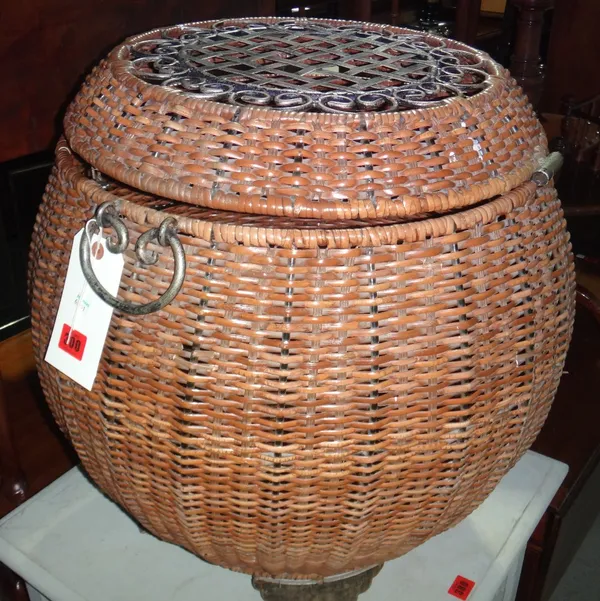A wicker and metal bound laundry basket of spherical form, 56cm high.