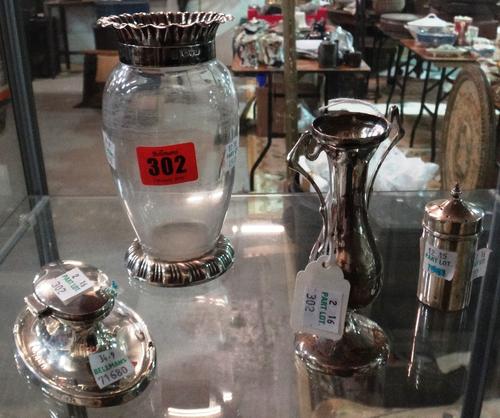 Silver and silver mounted wares, comprising; a glass vase, mounted with a silver rim and foot, Chester 1900, an oval inkstand, Birmingham 1912, a twin