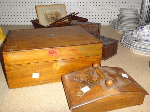 A quantity of assorted wooden boxes, 19th century and later, including a walnut jewellery box, a carved oak box, an Oriental black lacquer box and sun