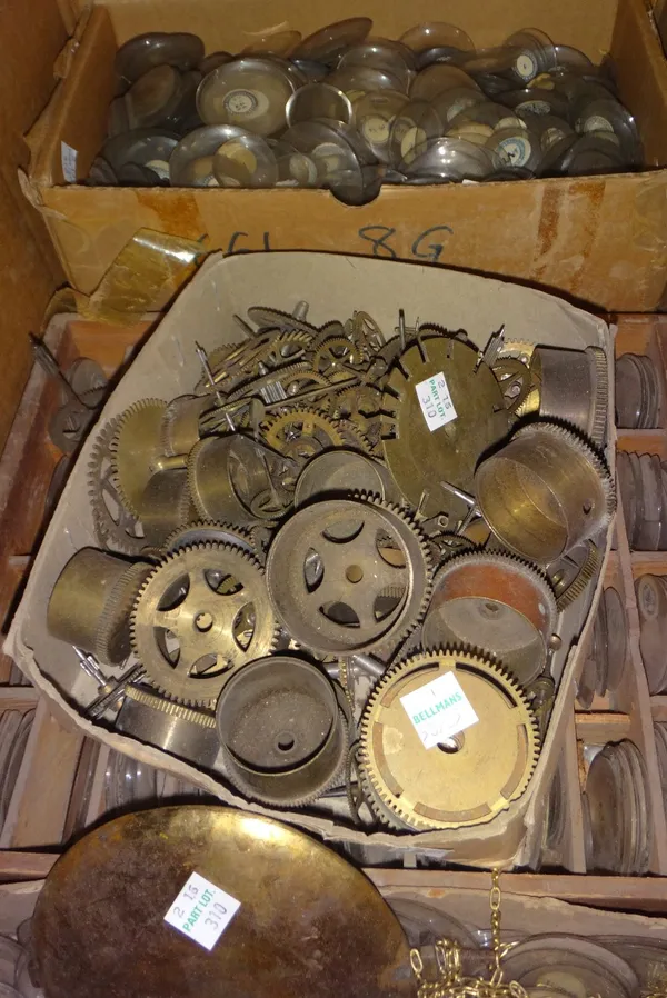 Horological interest; a large quantity of watch and clock making parts, mainly pocket watch glasses.