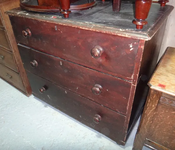 A 19th century stained pine three drawer chest.