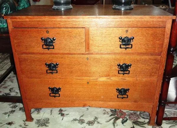 An early 20th century oak chest of two short and two long drawers.
