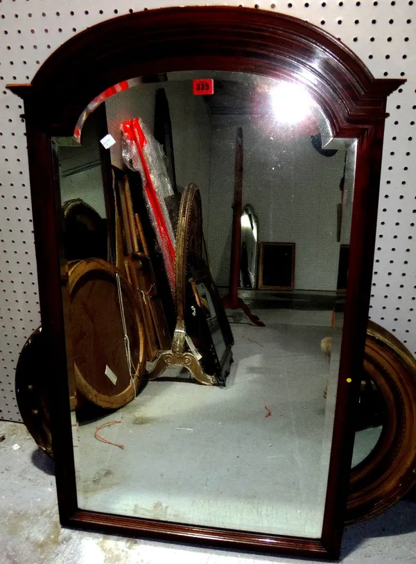 A Maple & Co. mahogany arch top mirror.
