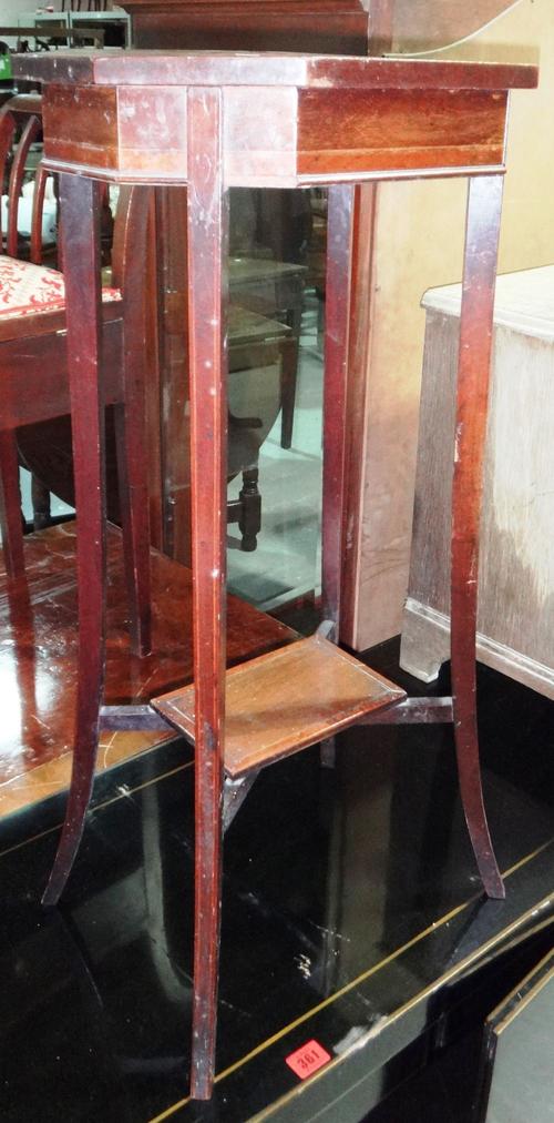 A mahogany two tier jardiniere stand and an oval tray.